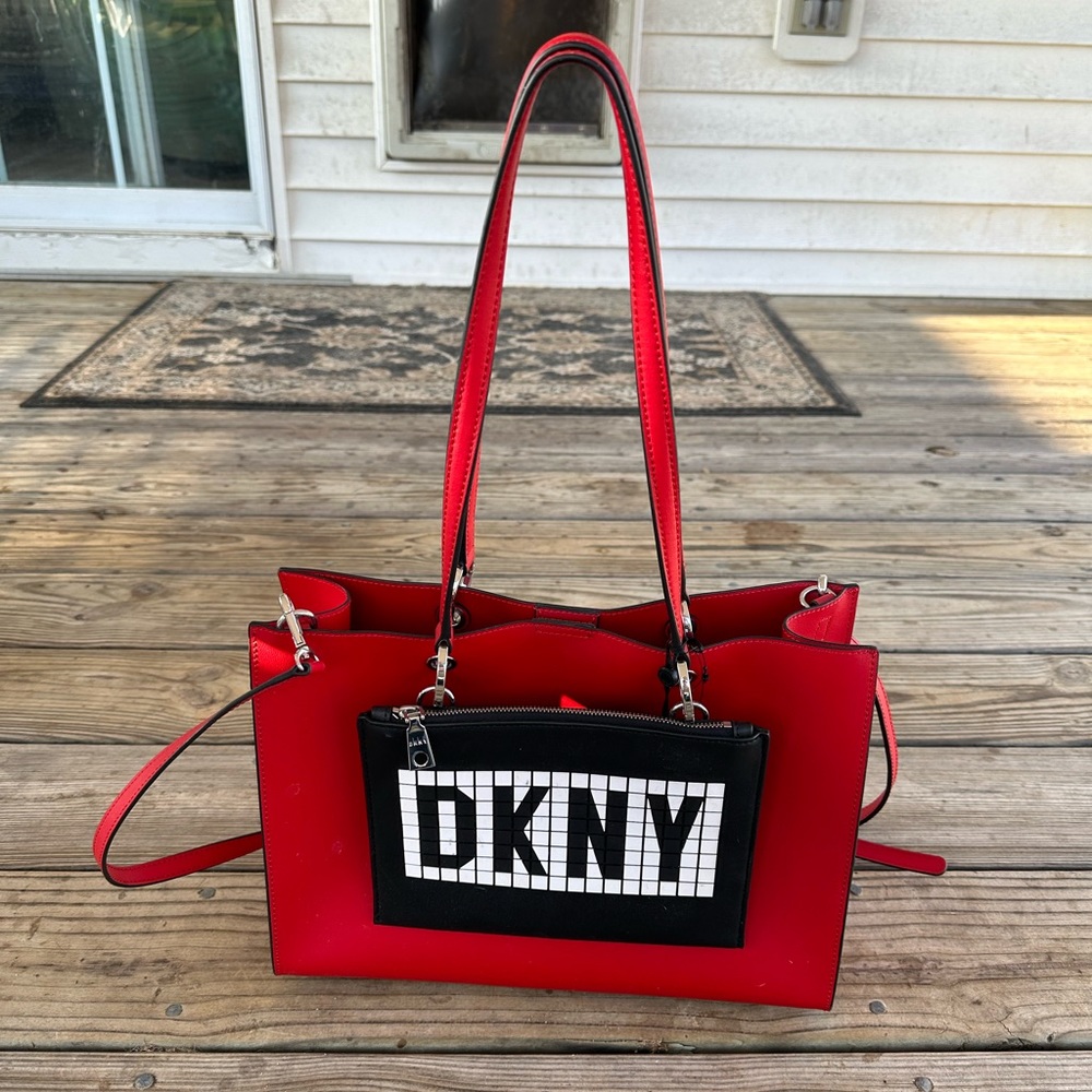 Red DKNY handbag. Brand new with tags.